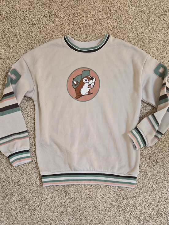 BUC-EE'S Tops - Cream Crewneck Sweater with Mascot Patch and Green & Pink Stripes
